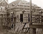 Men Building House