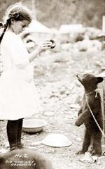 Girl and bear cub