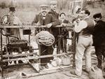 Men engage at apparatus