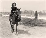 Girl Riding Horse