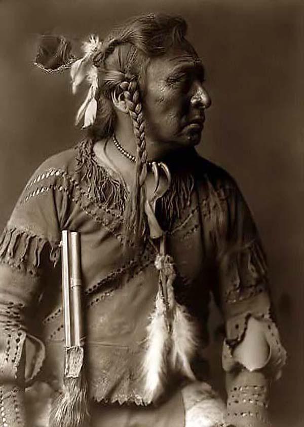 Indian Holding a Rifle