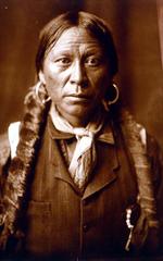 Head-and-shoulders portrait of a Jicarilla man.
